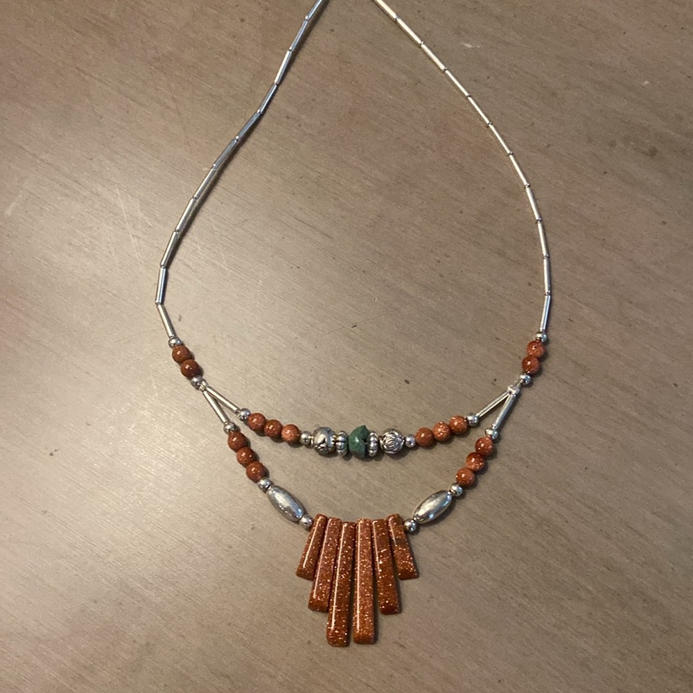 Sandstone necklace on silver necklace